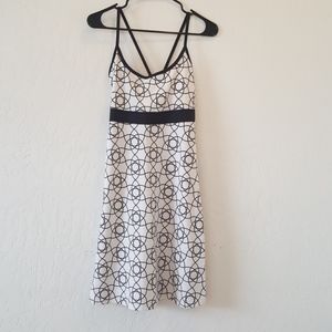 Cute strappy black and white dress.